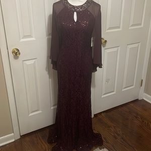 Full length evening gown with embellished neckline